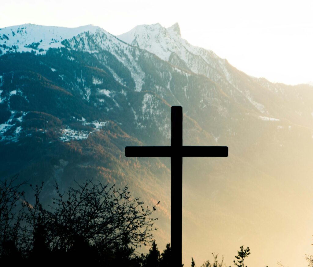 The holy cross with a hugh mountain in the background